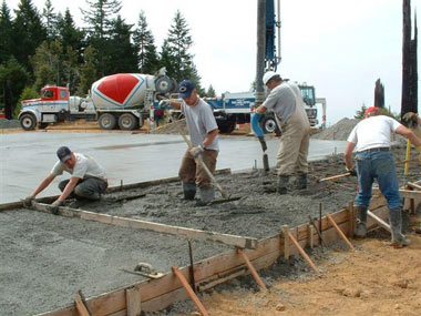 KFPD and contractors pouring concrete slab